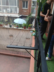 Tendedero de pared plegable negro para ahorrar espacio en casa o balcón